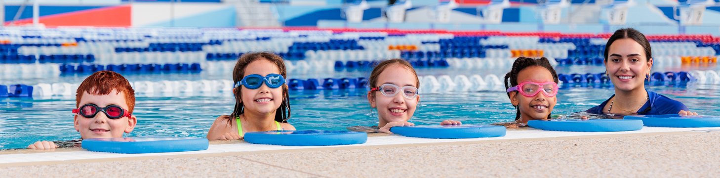 Children in pool for swimming lessons